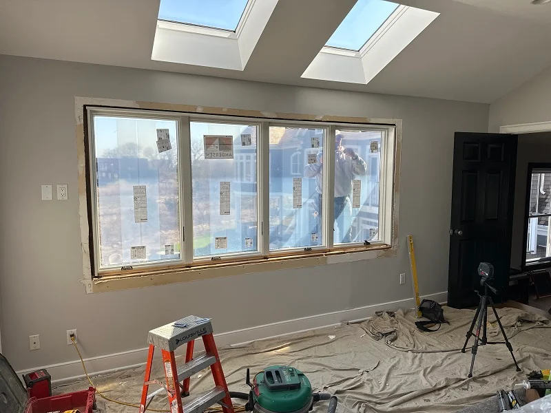 Using a laser level to install Andersen 400 Series casement windows in Norwalk, CT